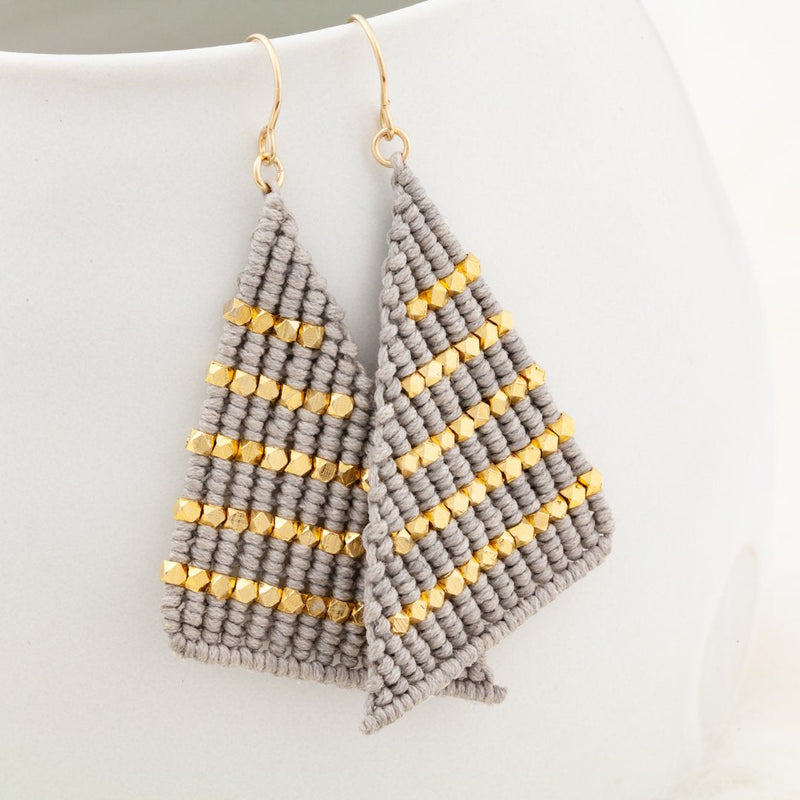 Grey and Gold triangle shaped macrame earrings inspired by Butterfly wings. Boho chic style meets Modern Macrame. Artisan made in India. Gifts that give hope.