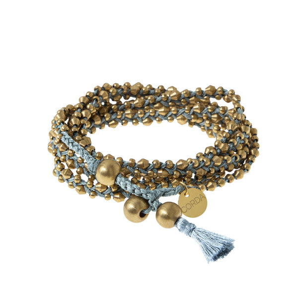 Blue Braided Necklace and Bracelet Wrap in Brass Beads. The Stellina Wrap by Corda.